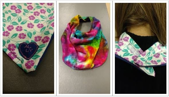 Three images. 1) close-up of the corner of a garment protector shows a heart with initials embroidered. 2) a tie-dye styled adult bib. 3) close-up of how a garment protector fastens on the back of the neck with velcro.
