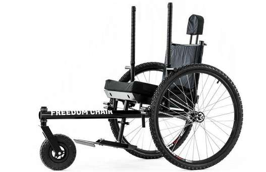 A manual all-terrain wheelchair with knobby tires and an extended single front wheel.