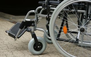 A manual wheelchair up close.