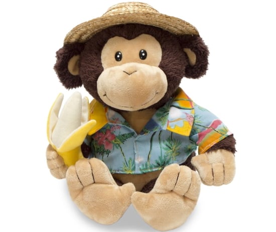 A plush toy monkey holding a banana