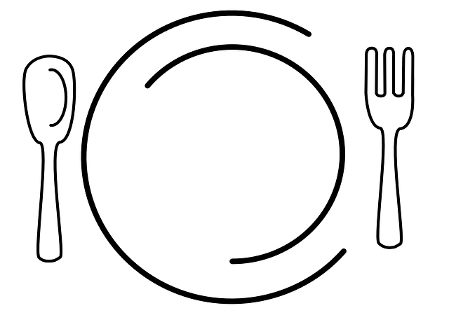 Minimalist drawing of a plate, spoon and fork.