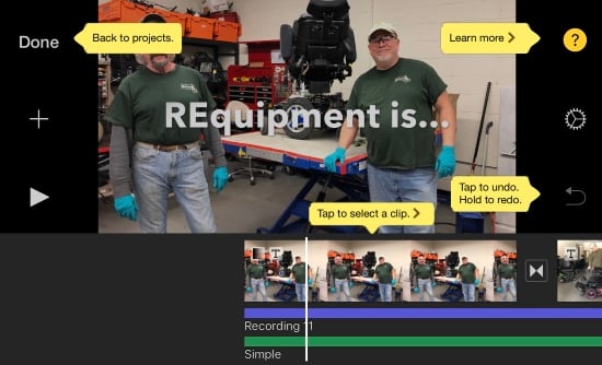 iMovie app screenshot shows project timeline with two audio tracks one labeled recording 1, the other labeled Simple. Shows image of men with a powerchair on a workbench and the title REquipment is... centered on thumbnail image. iMovie help labels highlight how to tap to select a clip, tap to undo. Hold to redo. And Learn more icon.
