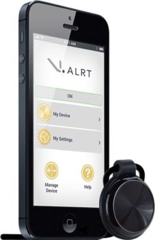 A smartphone with the V.ALRT app on the display. Also a medallion activation button on a ring.