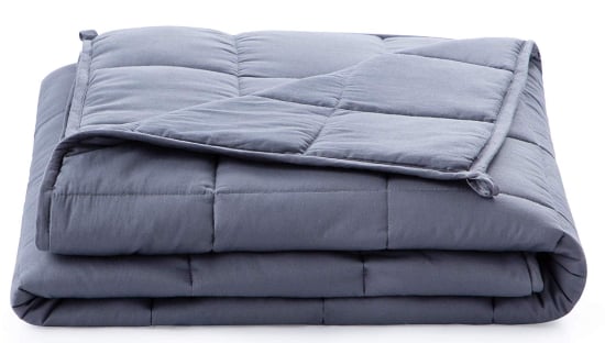 A folded comforter.