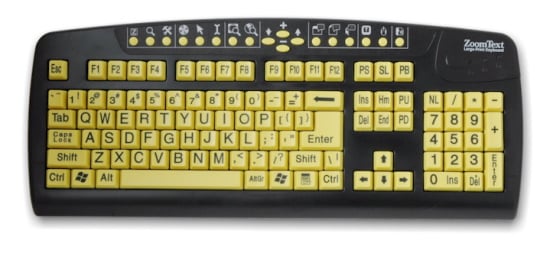 A computer keyboard with large yellow keys and bold black letters.
